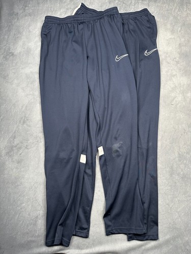 Nike - x,